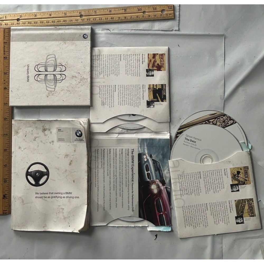 BMW Experience Performance DVD Set – "Uniquely BMW"‎ / "The Debt" (Original OEM)